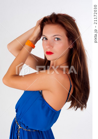 Beautiful young red haired woman with freckles 21172030
