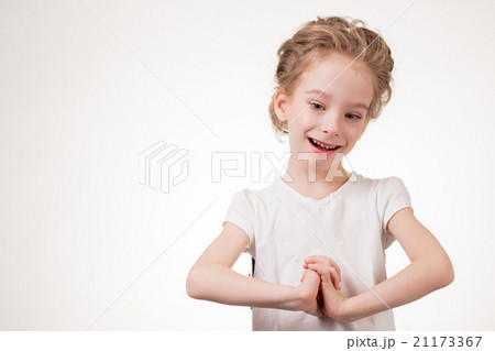 Portrait of surprised excited girl covering her Portrait of surprised excited girl covering her 21173367