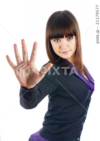 Pretty girl shows stop gesture Pretty girl shows stop gesture 21179577