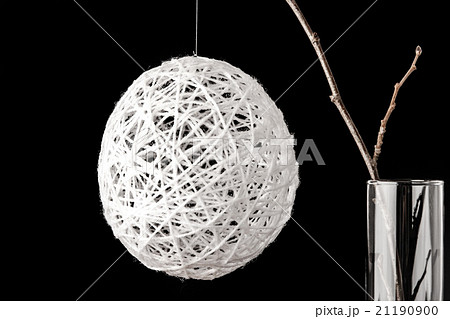 Alder branch in the glass with a christmas ball Alder branch in the glass with a christmas ball 21190900