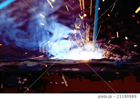 Welder working metal spark 21190989