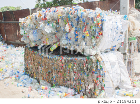 Plastic bottles pressed and packed for recycling Plastic bottles pressed and packed for recycling 21194211