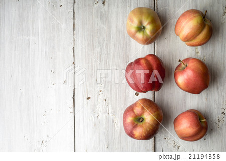 Summer red apples on white boards Summer red apples on white boards 21194358