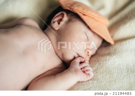 Child baby boy with tulip. Mothers day 21194483