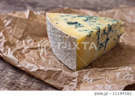 Cheese with a blue mold on the paper Cheese with a blue mold on the paper 21194582