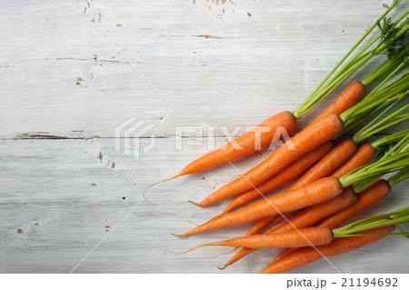 Carrots on the white background Carrots on the white background 21194692
