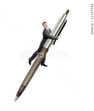 Businessman flying on big pen 21197448