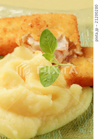 Fried breaded fish with mashed potato Fried breaded fish with mashed potato 21200280