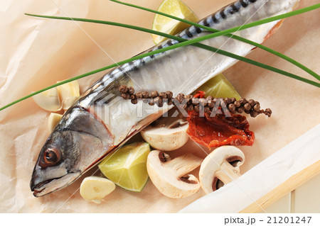 Fresh mackerel on parchment paper 21201247