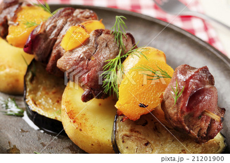 Beef shish kebab with slices of potato and eggplant 21201900