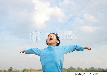 Happy Asian boy outdoor in morning Happy Asian boy outdoor in morning 21204528