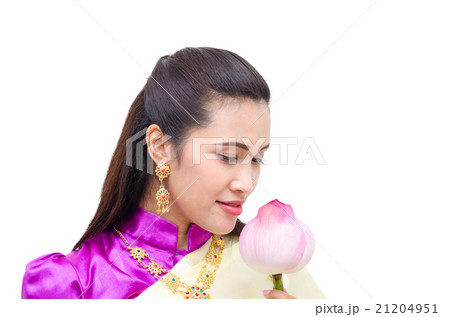 Thai woman in traditional costume with lotus Thai woman in traditional costume with lotus 21204951
