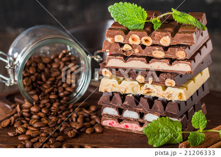 An assortment of white, dark, and milk chocolate An assortment of white, dark, and milk chocolate 21206333