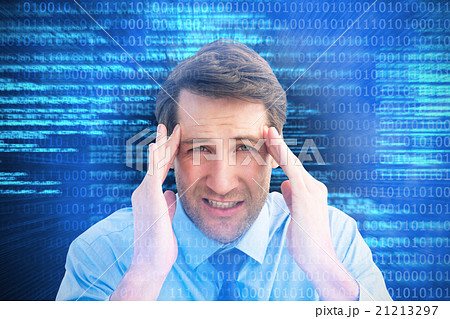 Composite image of young businessman with severe headache Composite image of young businessman with severe headache 21213297