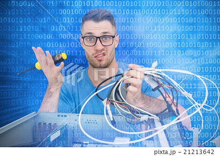Composite image of portrait of confused it professional with scr Composite image of portrait of confused it professional with scr 21213642