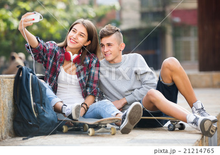 friends taking picture for selfie friends taking picture for selfie 21214765