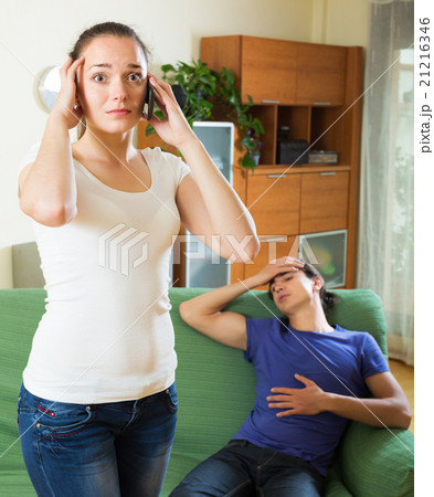 Woman calling to emergency Woman calling to emergency 21216346