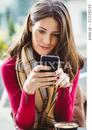 Woman using her smartphone 21218243