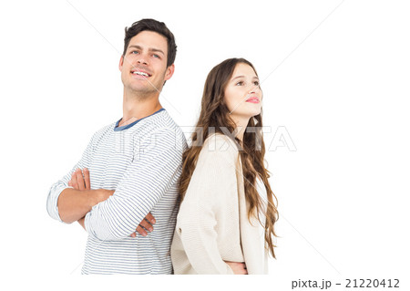 Couple standing back to back Couple standing back to back 21220412