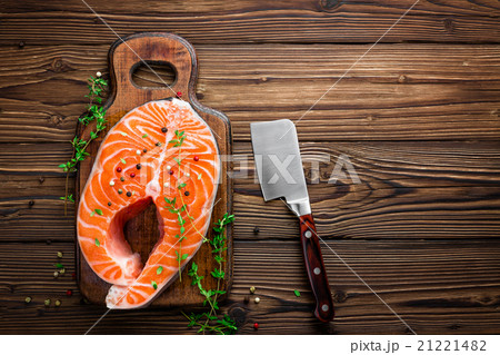 raw salmon fish steak on wooden rustic background 21221482