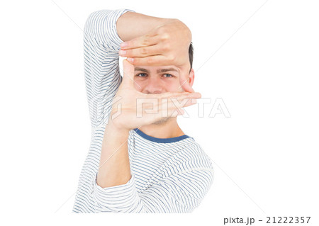 Man looking at camera and gesturing Man looking at camera and gesturing 21222357