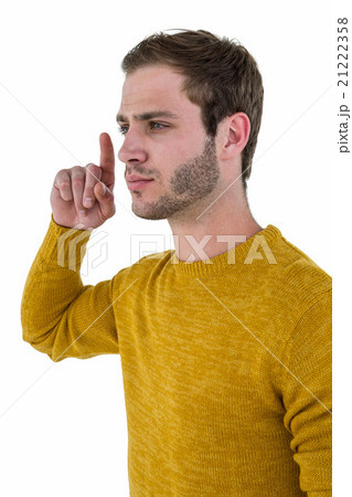Hipster man pointing in the air Hipster man pointing in the air 21222358