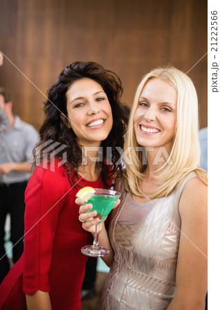 Portrait of beautiful women having drinks Portrait of beautiful women having drinks 21222566