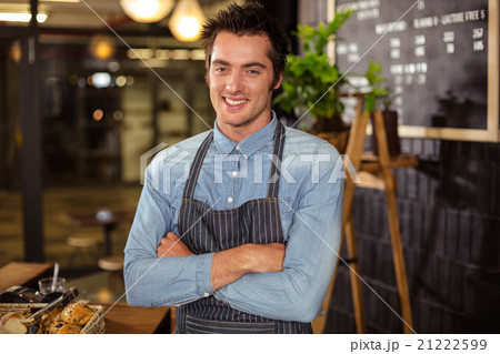 Portrait of a barista with arms crossed Portrait of a barista with arms crossed 21222599