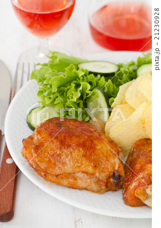 fried chicken with potato chips and salad fried chicken with potato chips and salad 21230928