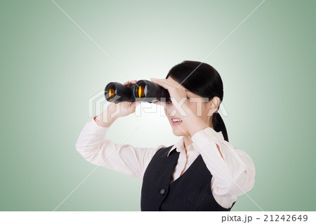 business woman holding a binoculars 21242649
