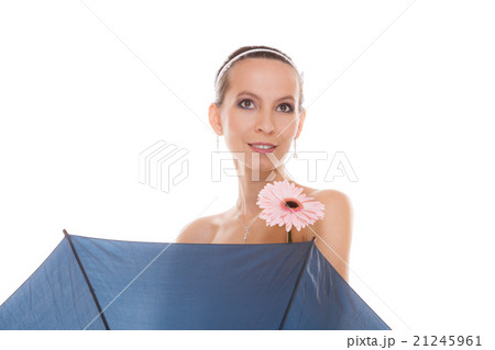 Pretty bride woman holding umbrella and flower. 21245961