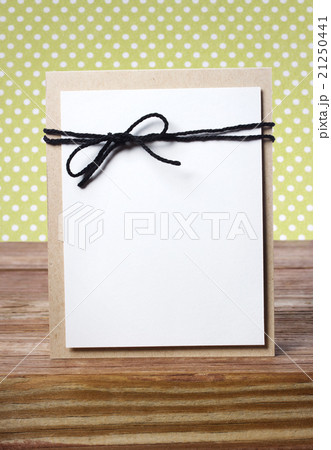 Handmade card on wooden table Handmade card on wooden table 21250441