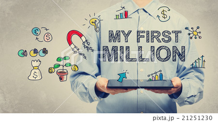 My First Million concept with young man holding a tablet 21251230