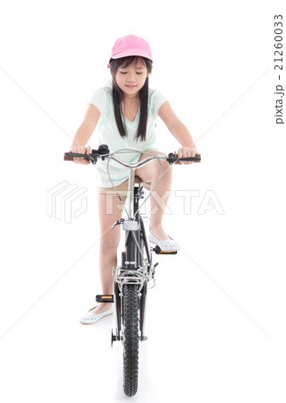 Asian girl riding a bike 21260033