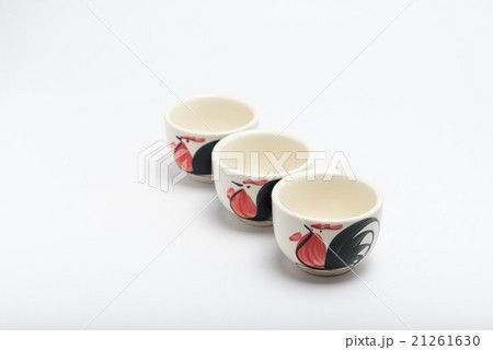 Asian ceramics tea cup on white background 21261630