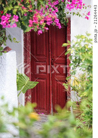 Oia village on Santorini with old door in Greece 21264443