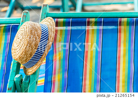 Woven hat on the beach chair Woven hat on the beach chair 21265154