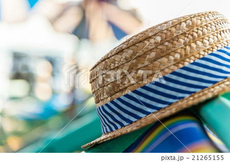 Woven hat on the beach chair Woven hat on the beach chair 21265155