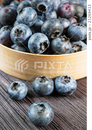 Blueberry on wooden board 21269413