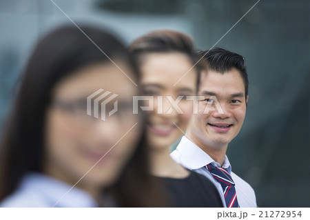 Three Asian business men and women. Three Asian business men and women. 21272954