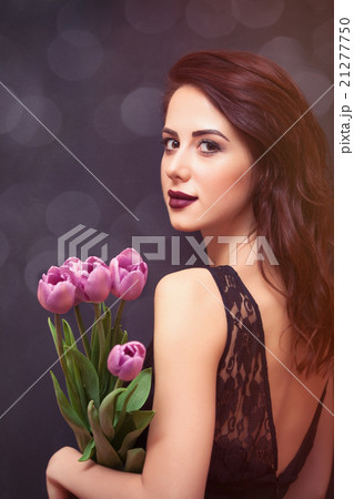 portrait of a young beautiful woman with flowers portrait of a young beautiful woman with flowers 21277750