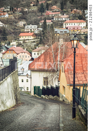 Street with ancient houses in the old town Banska Stiavnica, Slo 21286403