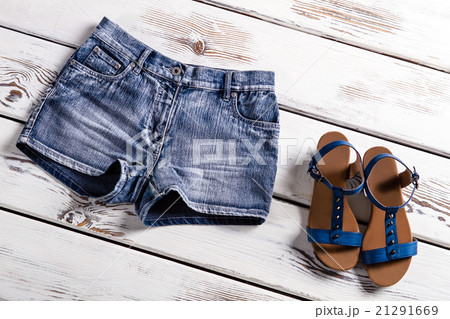 Woman's clothing on white shelf. Woman's clothing on white shelf. 21291669