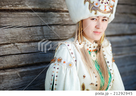 Portrait of a young woman in traditional dress. 21292945