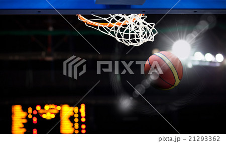 Basketball going through the hoop Basketball going through the hoop 21293362