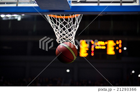 Basketball going through the hoop Basketball going through the hoop 21293366
