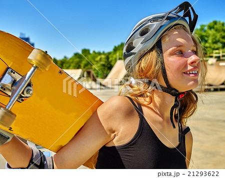 Teen girl rides his skateboard Teen girl rides his skateboard 21293622