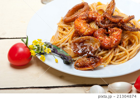 Italian seafood pasta on red tomato sauce Italian seafood pasta on red tomato sauce 21304874