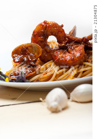 Italian seafood pasta on red tomato sauce Italian seafood pasta on red tomato sauce 21304875