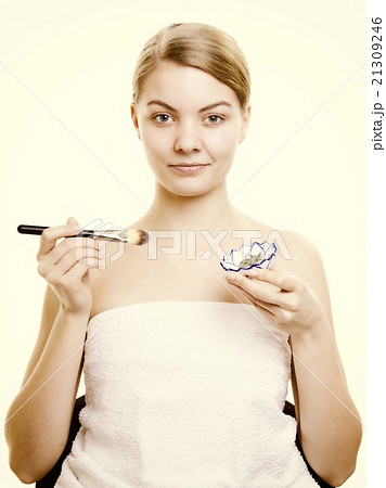 Skin care. Woman applying clay mask on face. Spa. Skin care. Woman applying clay mask on face. Spa. 21309246